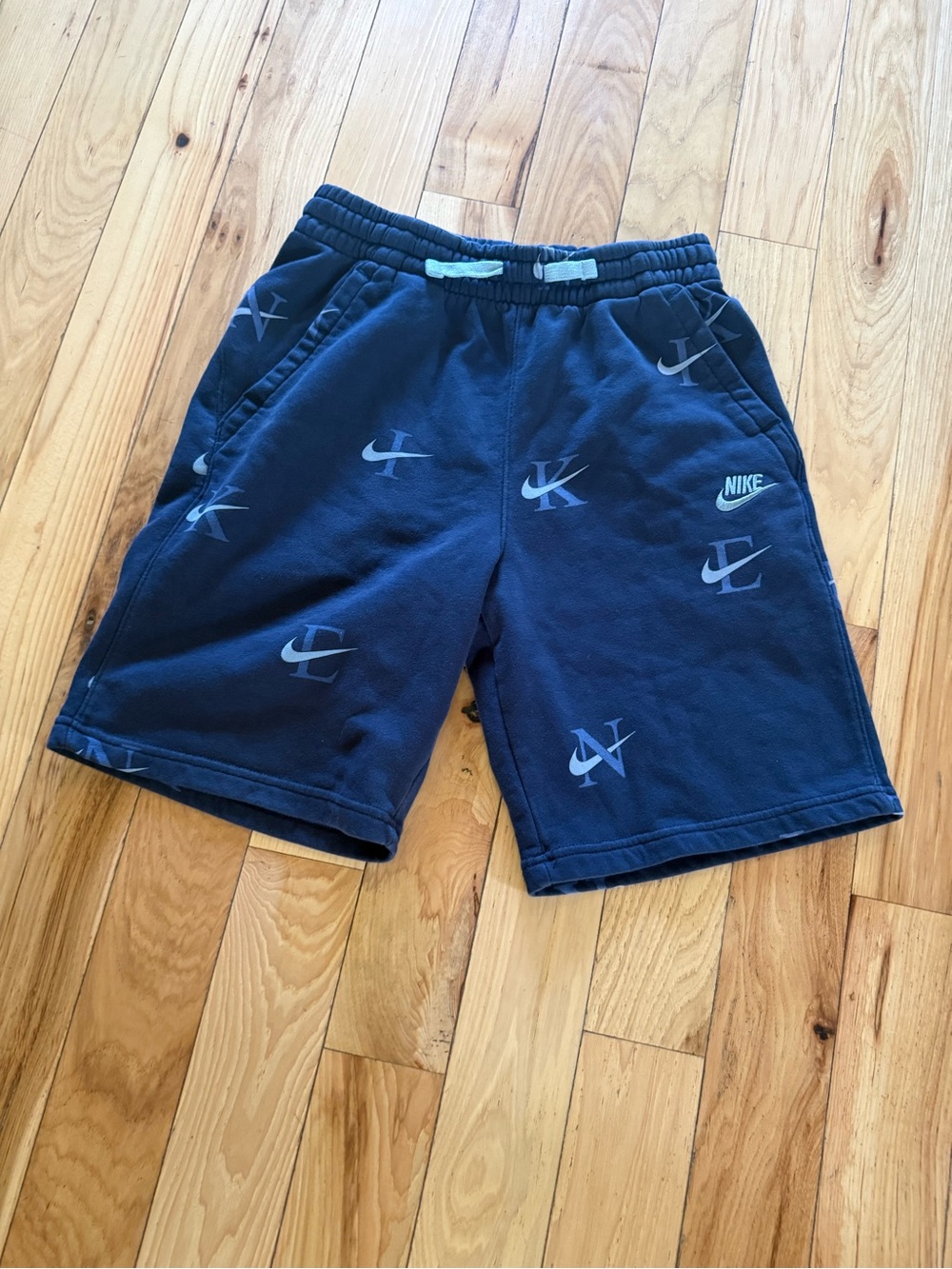 Nike navy blue shorts with white swooshes. Size XL
